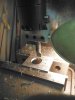 Using a boring head in the mill to make a 1.064 inch hole in a Rem 700 recoil lug 2-29-2012.jpg