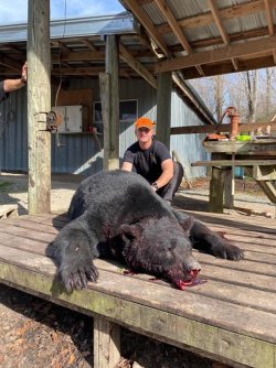 Christopher with Bear he shot with my 45-70b.jpg